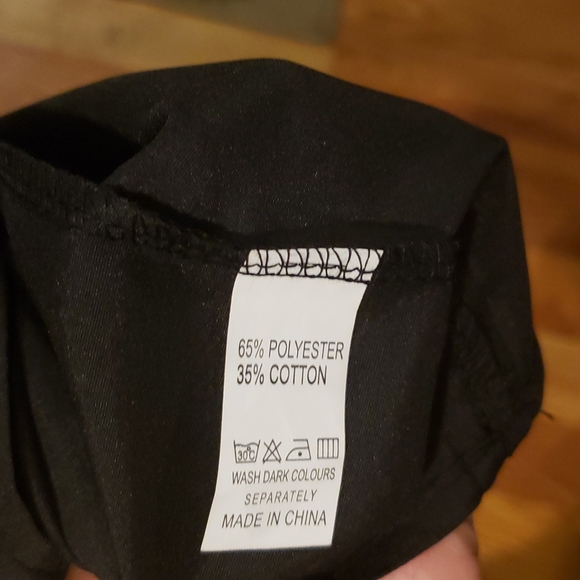 Blk Work or Travel Dress with Floral Detail. Never worn. Necklace not included. - Picture 7 of 9